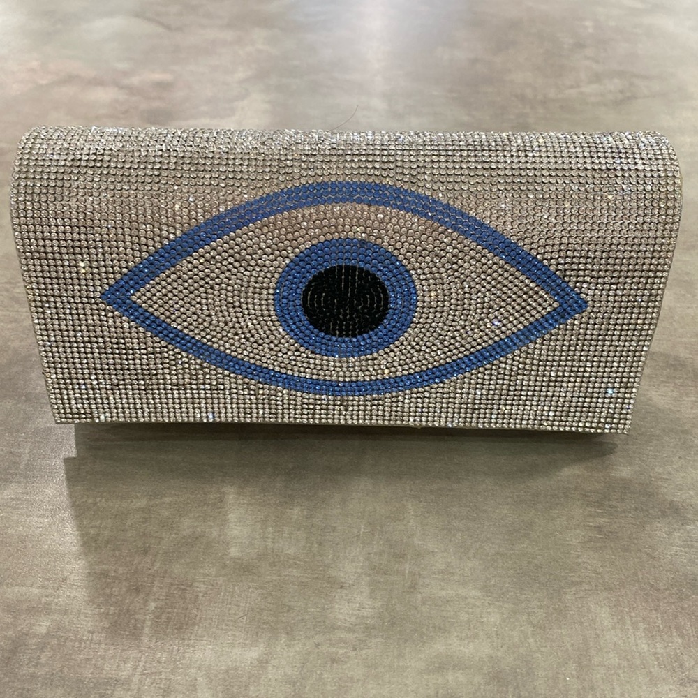 Elegant Silver Clutch with Blue Eye Design
